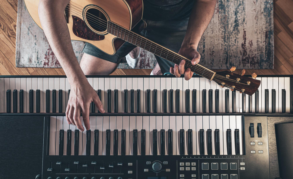 Composing music with a guitar and a keyboard